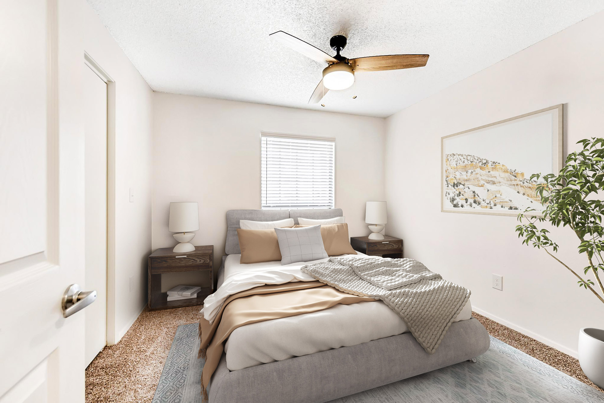 A bedroom at Canyon Chase apartments in Westminster, CO.