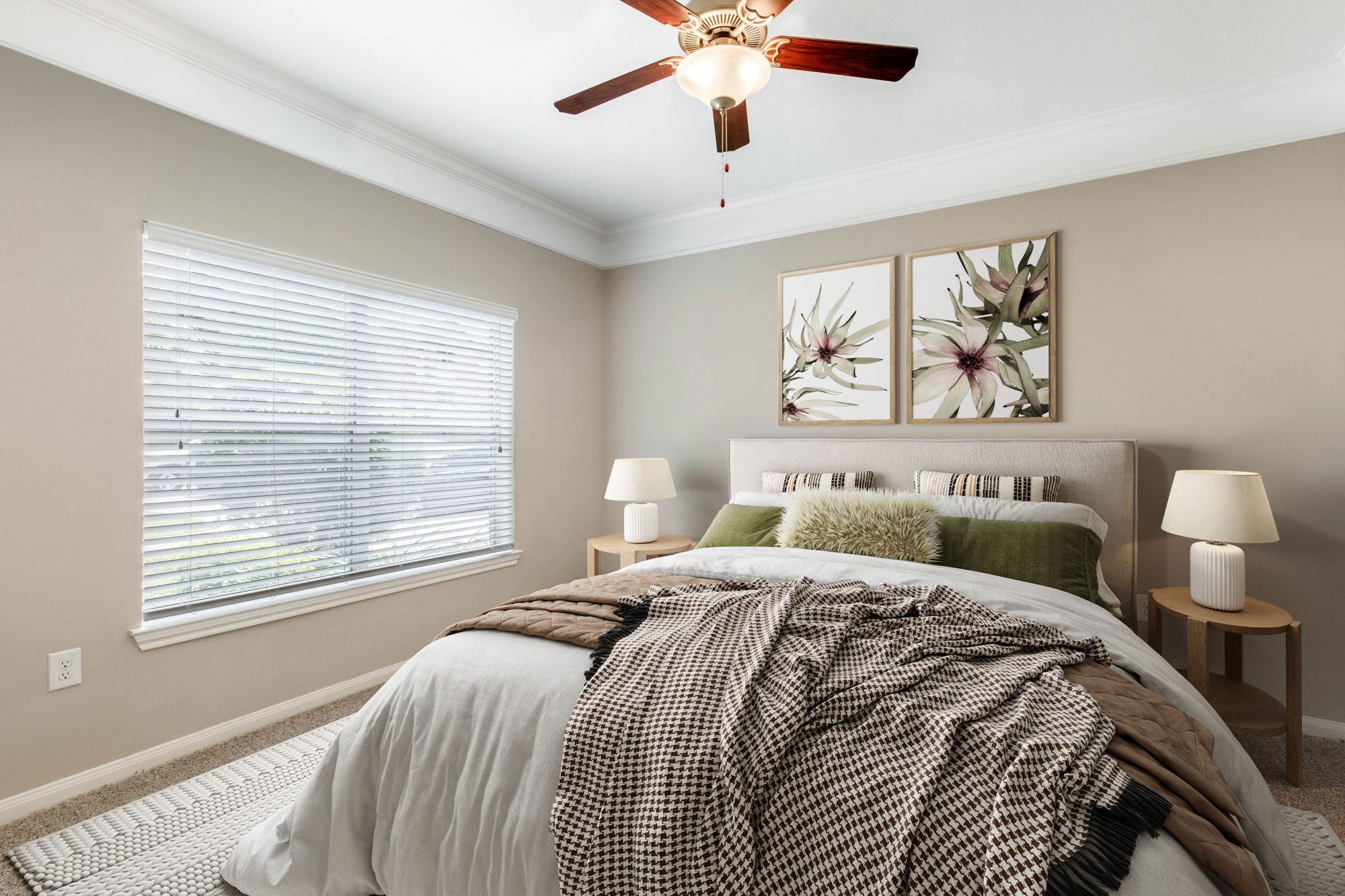 A bedroom at The Villas at Shadow Creek apartments in Houston, TX.