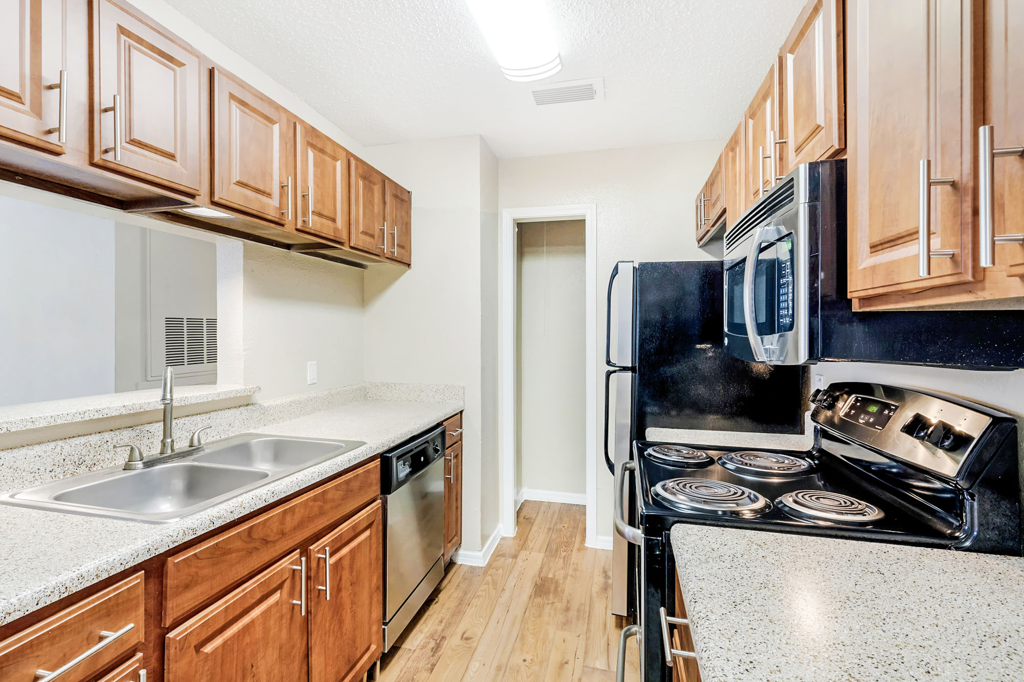 The kitchen in an apartment at The Gables of McKinney in McKinney, TX.