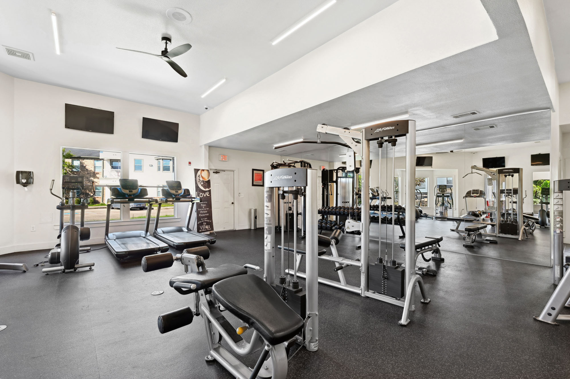 The fitness center at The Villas at Shadow Creek apartments in Houston, TX.